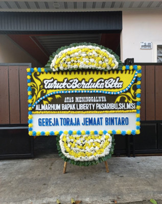 Papan Bunga Duka di Parwata
